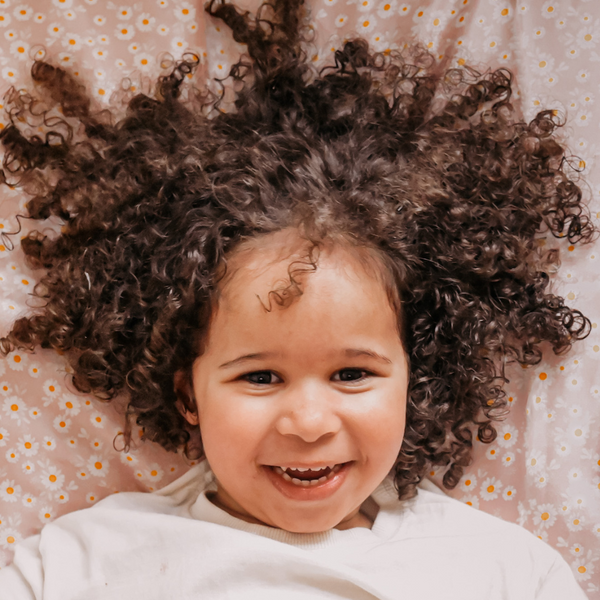 Nurturing Kids' Curls with Silk: Unlocking the Secrets to Beautifully Defined and Frizz-Free Hair